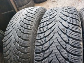 Гуми Зимни 215/65R17, снимка 4 - Гуми и джанти - 39136017