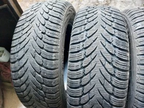 Гуми Зимни 215/65R17, снимка 2 - Гуми и джанти - 39136017