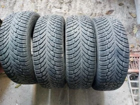 Гуми Зимни 215/65R17, снимка 1 - Гуми и джанти - 39136017