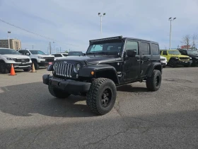 Jeep Wrangler * Sahara * CARFAX * АВТОКРЕДИТ БЕЗ ПЪРВОНАЧАЛНА, снимка 1