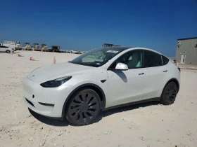 ������ Tesla Model Y