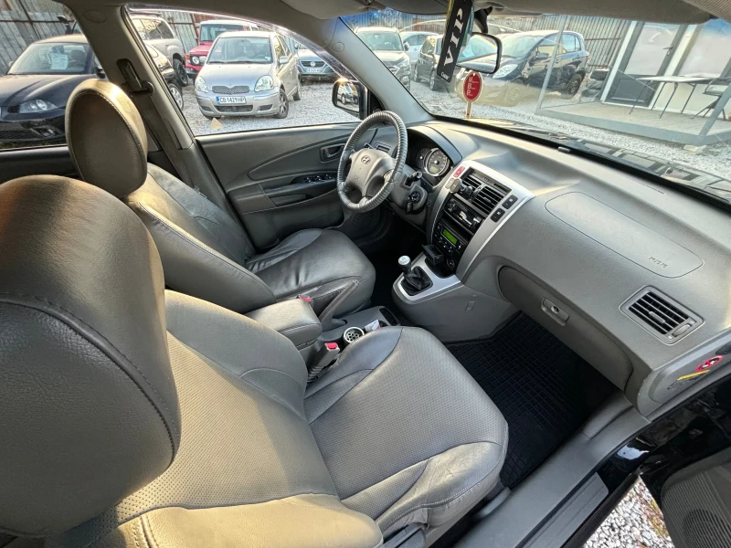 Hyundai Tucson, снимка 12 - Автомобили и джипове - 48031010