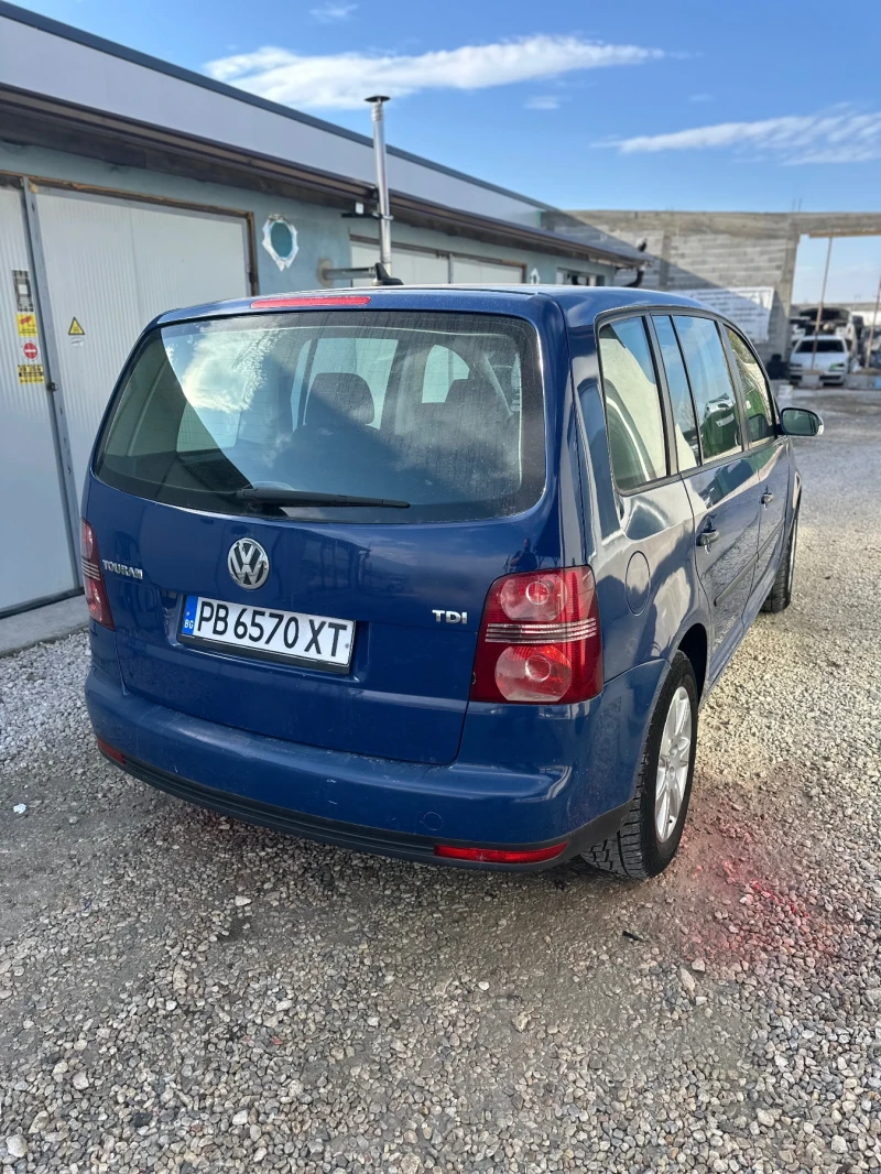 VW Touran 1.9 105ks автомат, снимка 4 - Автомобили и джипове - 52650406