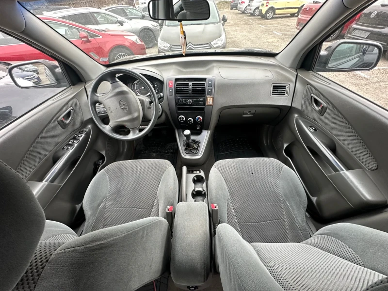 Hyundai Tucson 2.0CRDI* KLIMA* REALNI KM* OT BG* , снимка 13 - Автомобили и джипове - 49454792