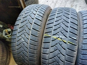 Гуми Зимни 235/65R17, снимка 2 - Гуми и джанти - 37682985