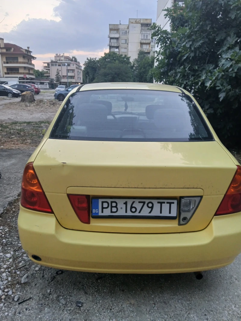 Suzuki Liana Liana, снимка 3 - Автомобили и джипове - 51977679