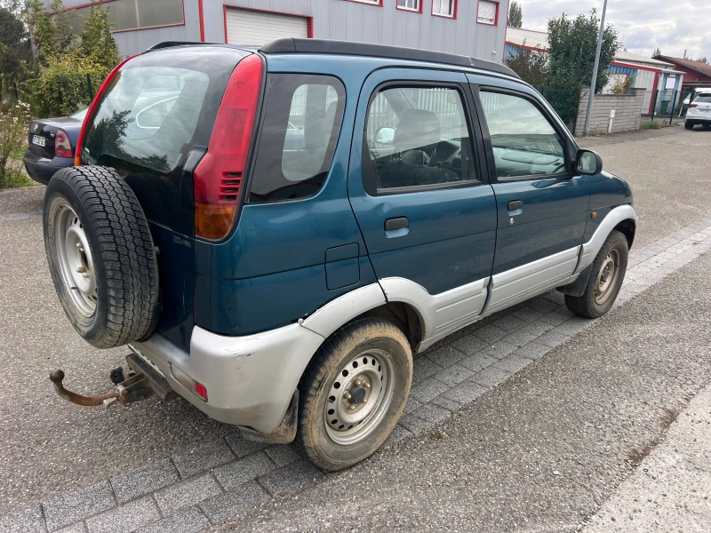 Daihatsu Terios 1.3i 4x4, снимка 12 - Автомобили и джипове - 52908901