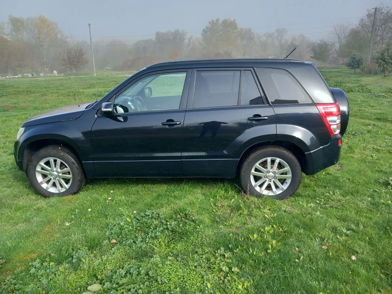 Suzuki Grand vitara 2.0 Бензин , снимка 4 - Автомобили и джипове - 52436697