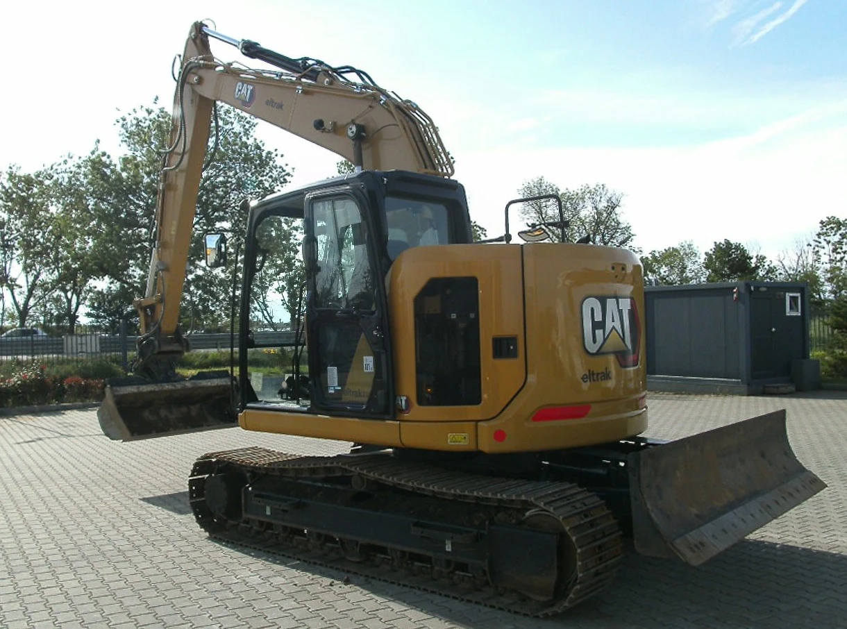 Багер Cat 315GC