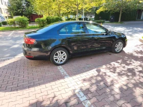 VW Jetta 1.6 TDI DSG Highline - ГАРАЖЕН /закупен от БГ/, снимка 4