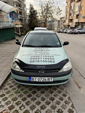 Opel Corsa 1.7tdi 75к.с КЛИМАТИК НОВИ ГУМИ, снимка 13