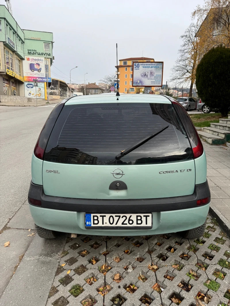 Opel Corsa 1.7tdi 75к.с КЛИМАТИК НОВИ ГУМИ, снимка 10 - Автомобили и джипове - 48138457