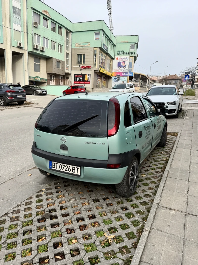 Opel Corsa 1.7tdi 75к.с КЛИМАТИК НОВИ ГУМИ, снимка 4 - Автомобили и джипове - 48138457