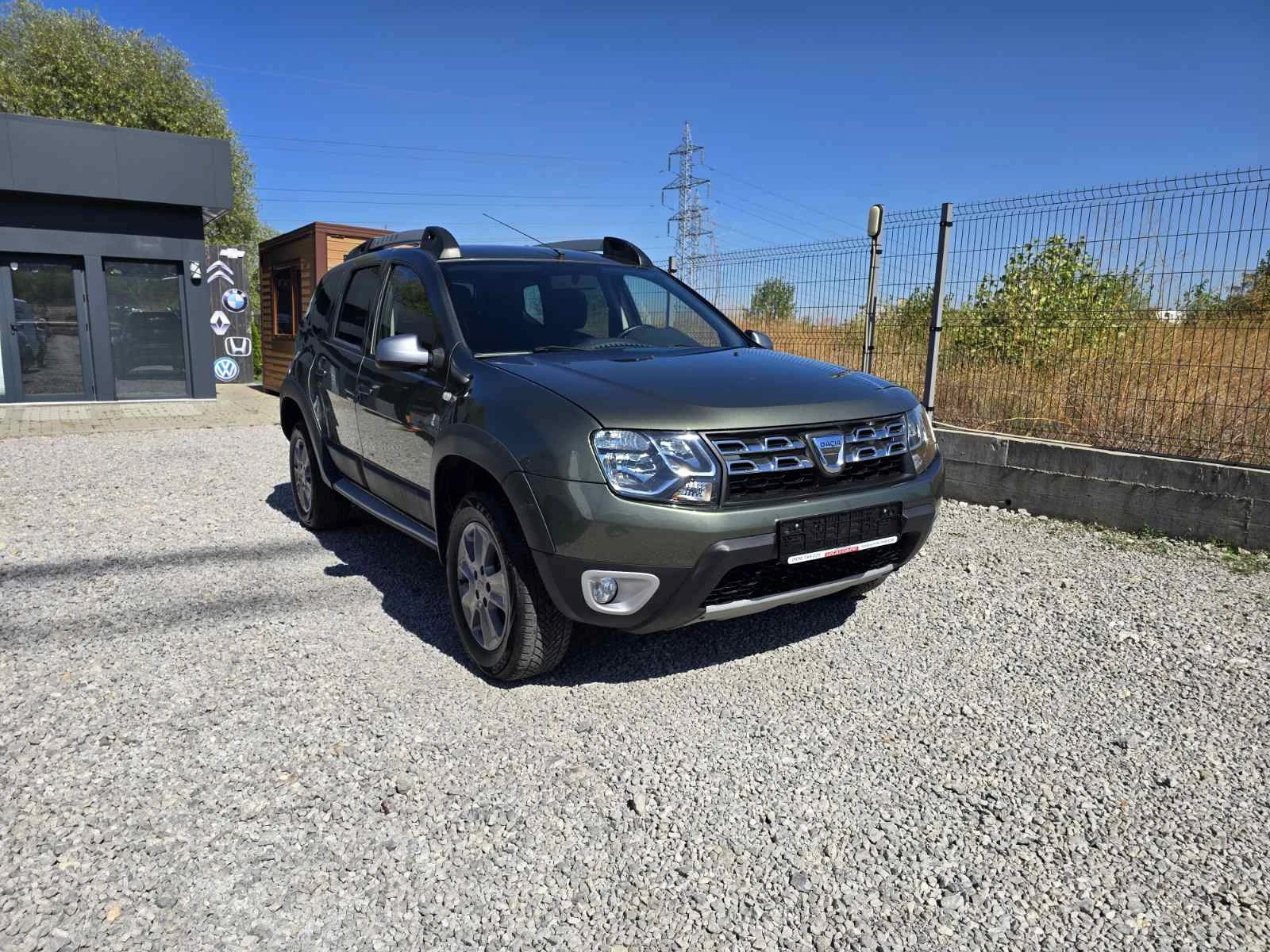Dacia Duster 1.6i КЛИМАТИК ГАЗ КАМЕРА, снимка 4 - Автомобили и джипове - 55961174