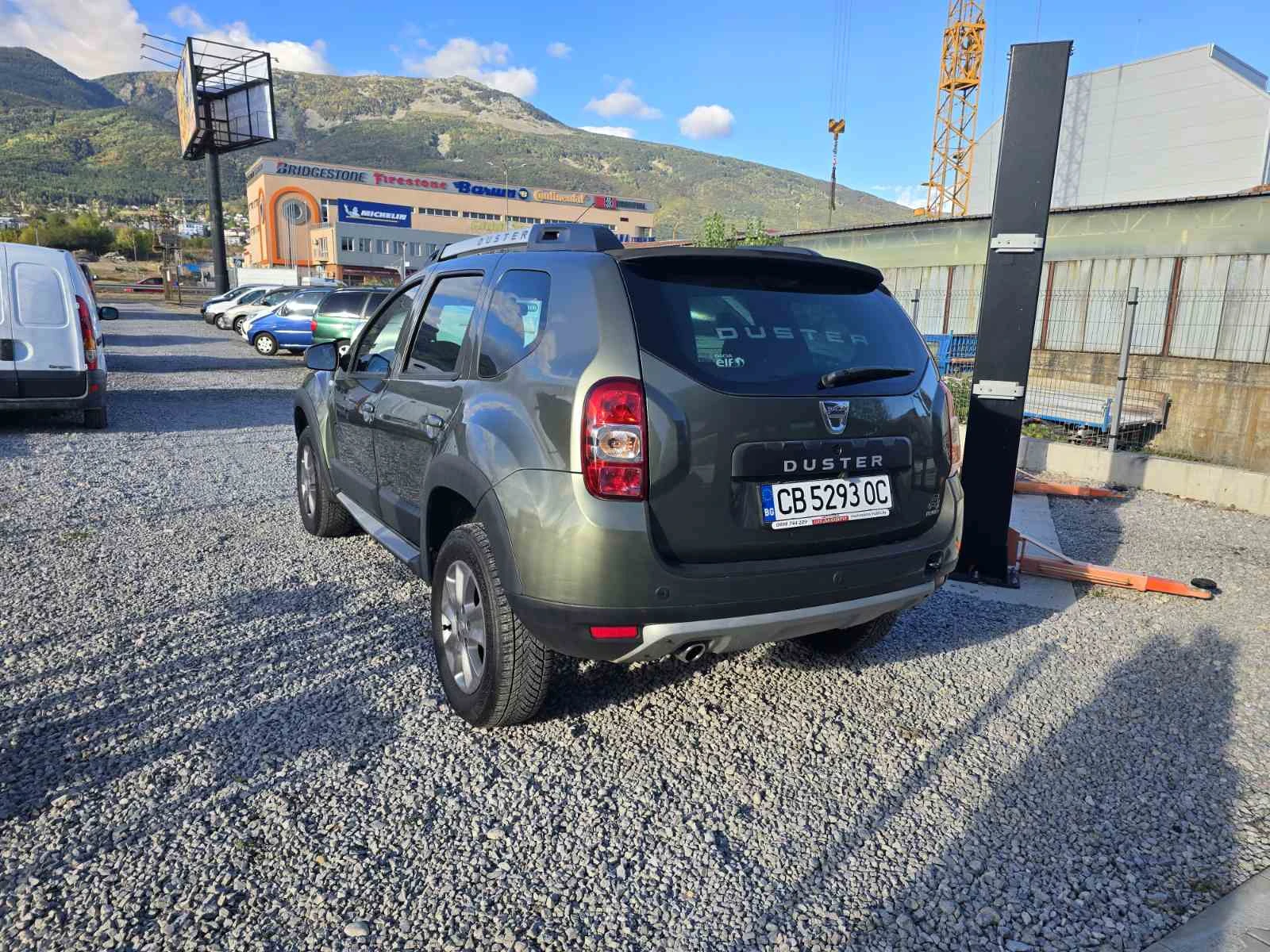 Dacia Duster 1.6i КЛИМАТИК ГАЗ КАМЕРА, снимка 2 - Автомобили и джипове - 55961174