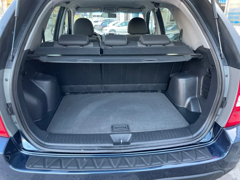 Kia Sportage 2.0 Active, снимка 10 - Автомобили и джипове - 52697310