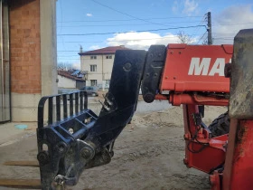 Телескопични товарачи Manitou 1440, снимка 10