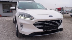 Обява за продажба на Ford Kuga 4×4/2.0D-TITANIUM/LED/NAVI/КАМЕРА/БЯЛА ПЕРЛА/ ~39 900 лв. - изображение 1