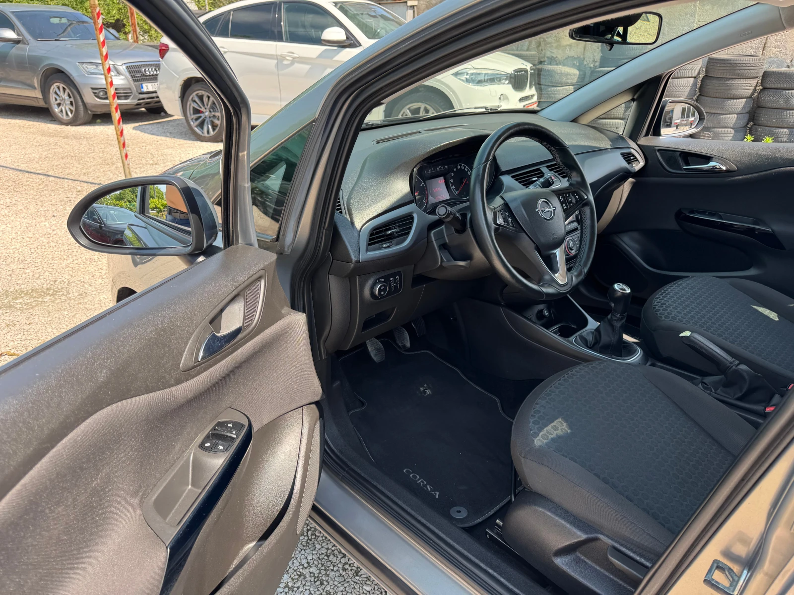 Opel Corsa 1.4i-90кс., снимка 12 - Автомобили и джипове - 54682468