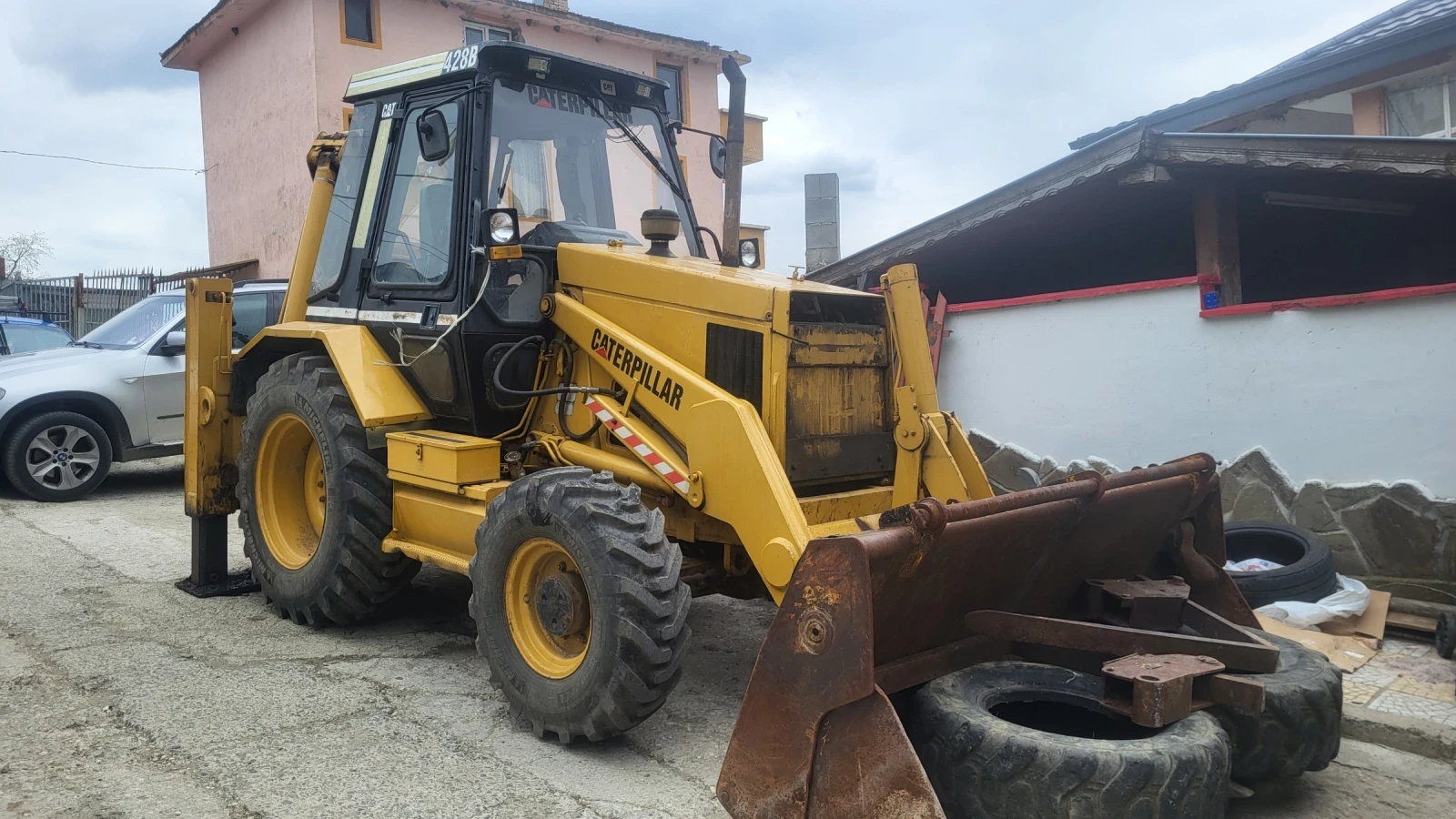 Багер Caterpillar 428b - изображение 4