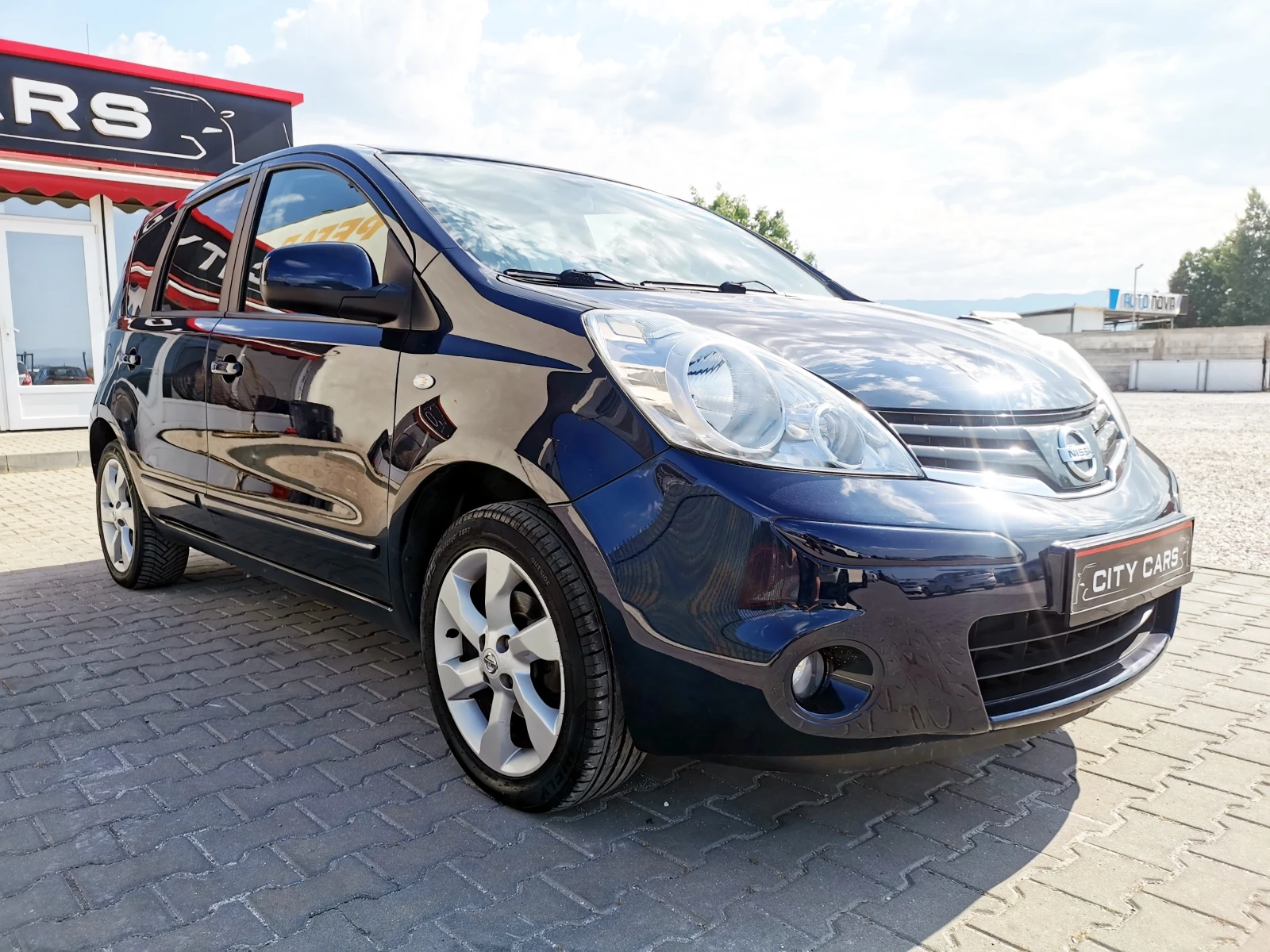 Nissan Note 1.6i - изображение 6