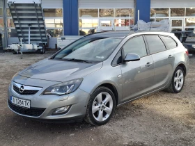 Opel Astra J Sports Tourer, снимка 1
