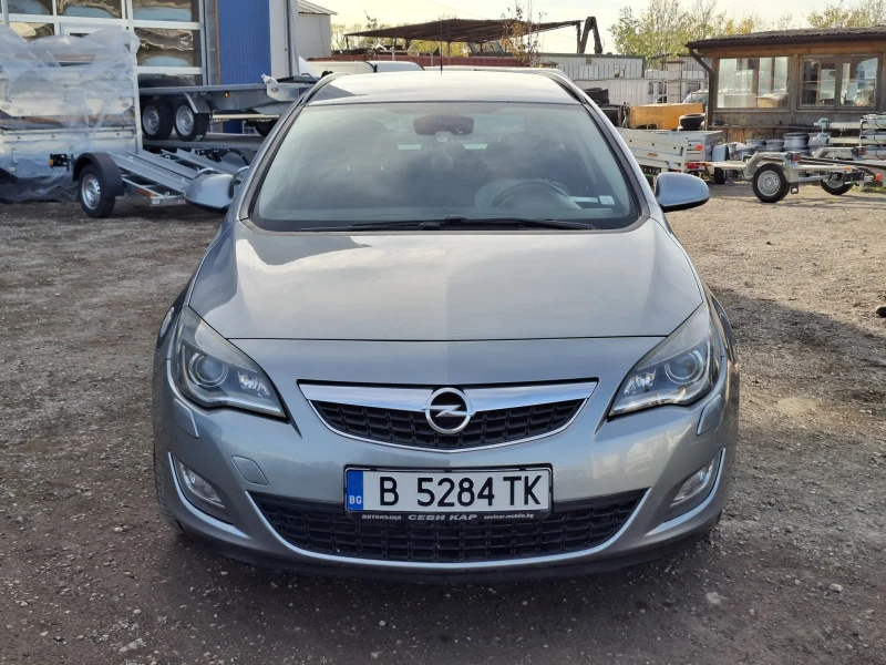Opel Astra J Sports Tourer, снимка 2 - Автомобили и джипове - 52709040