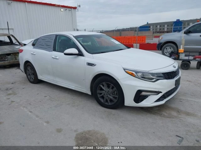 Kia Optima LX * ЦЕНА ДО БЪЛГАРИЯ* (CARFAX), снимка 14 - Автомобили и джипове - 49428398