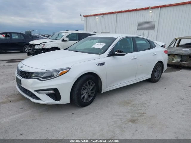 Kia Optima LX * ЦЕНА ДО БЪЛГАРИЯ* (CARFAX), снимка 15 - Автомобили и джипове - 49428398