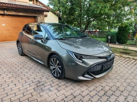 Toyota Corolla --2.0 HYBRIDE--BI TONE-КОЖА-ANDROIA AUTO-CAR PLAY, снимка 3