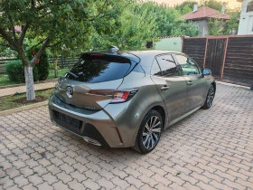 Toyota Corolla --2.0 HYBRIDE--BI TONE-КОЖА-ANDROIA AUTO-CAR PLAY, снимка 4