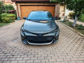 Toyota Corolla --2.0 HYBRIDE--BI TONE-КОЖА-ANDROIA AUTO-CAR PLAY, снимка 2