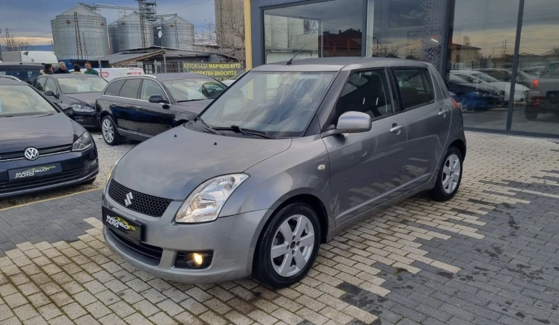 Suzuki Swift 1.3DDIS* * ПЪЛНА ГАРАНЦИЯ* * , снимка 6 - Автомобили и джипове - 53268453