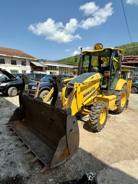      Komatsu WB93R-5