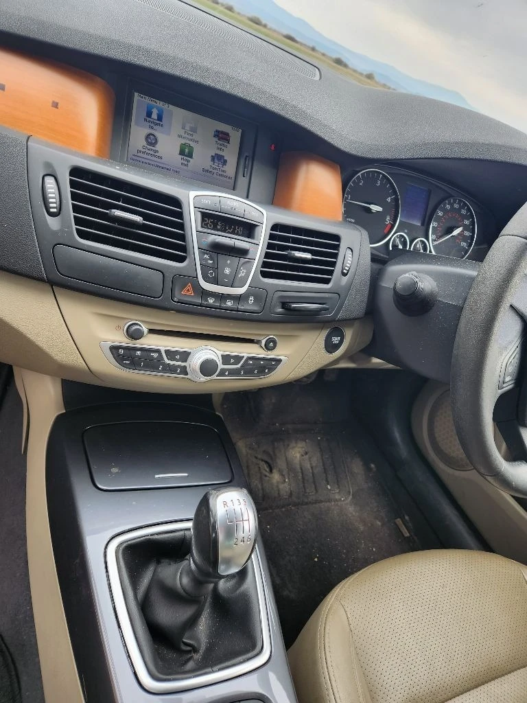 Renault Laguna 2.0 dci, снимка 11 - Автомобили и джипове - 40064506