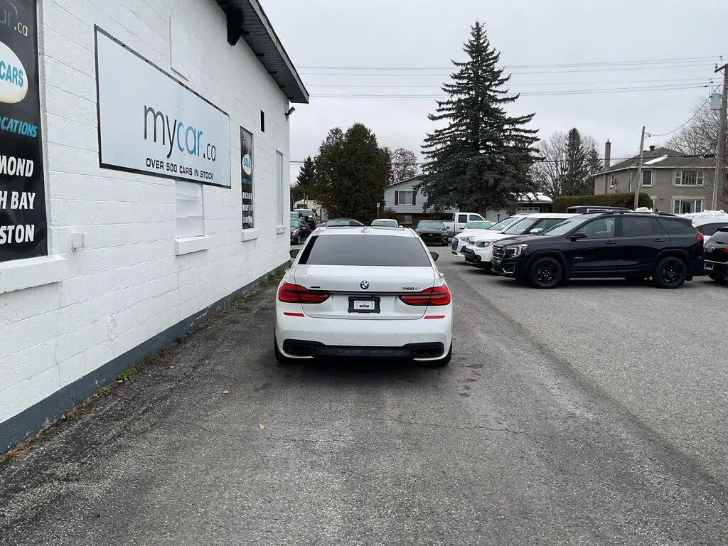 BMW 750 LI /HEAD UP/360/EKPAHИ/FIRST CLASS/PANO, снимка 5 - Автомобили и джипове - 55118523