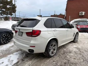 BMW X5 2014 XDRIVE50I / HEAD-UP / 360 / PANO  - 13490 € / 26384.15 лв. - 15982969 4