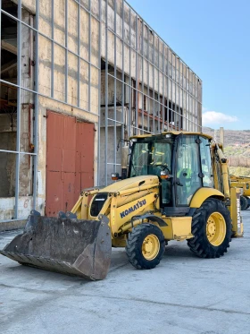 Багер Komatsu WB93R-5, снимка 1