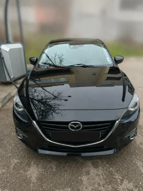 ������ Mazda 3