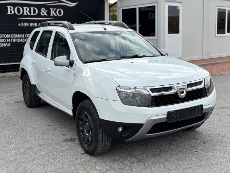 Dacia Duster 1.6 i   4x4, снимка 2 - Автомобили и джипове - 51912048