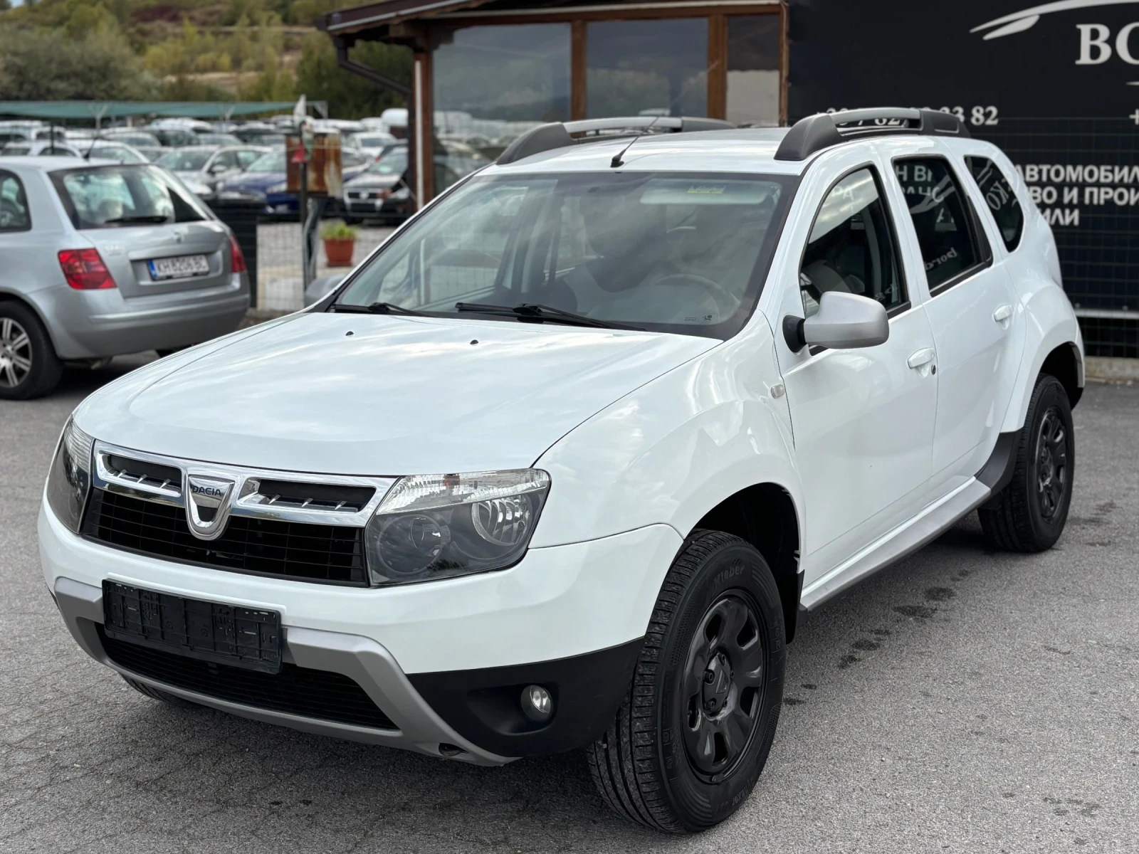 Dacia Duster 1.6 i   4x4, снимка 1