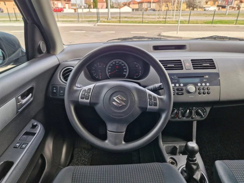 Suzuki Swift 1.3 / 92 к.с, снимка 14 - Автомобили и джипове - 49513372