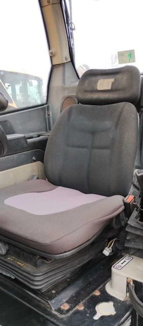 Телескопичен товарач Caterpillar TH337C, снимка 7