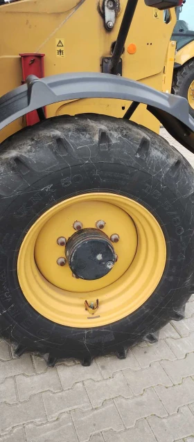 Телескопичен товарач Caterpillar TH337C, снимка 14