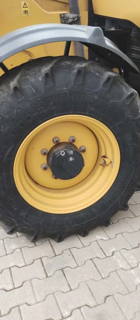 Телескопичен товарач Caterpillar TH337C, снимка 15
