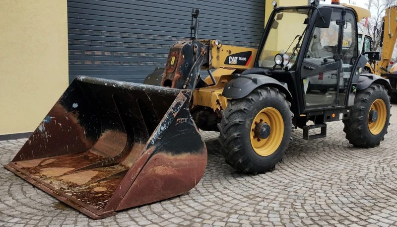 Телескопичен товарач Caterpillar TH337C, снимка 2 - Селскостопанска техника - 49648987