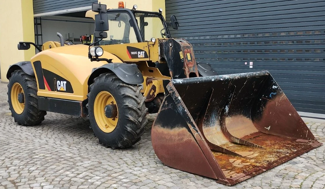 Телескопичен товарач Caterpillar TH337C, снимка 1