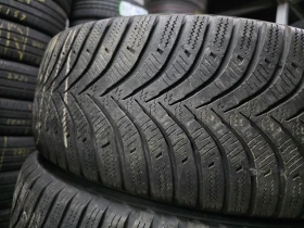 Гуми Зимни 215/65R16, снимка 2 - Гуми и джанти - 53122119