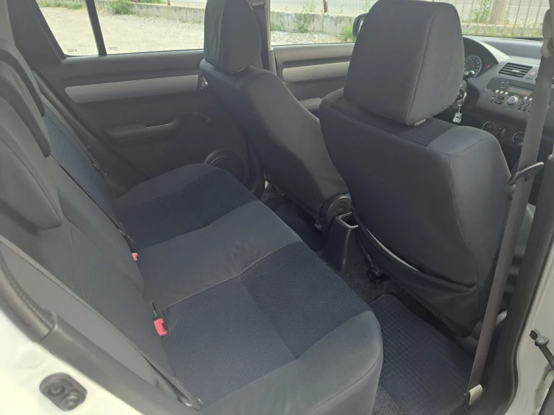 Suzuki Swift 1.3DDIS , снимка 9 - Автомобили и джипове - 51147203