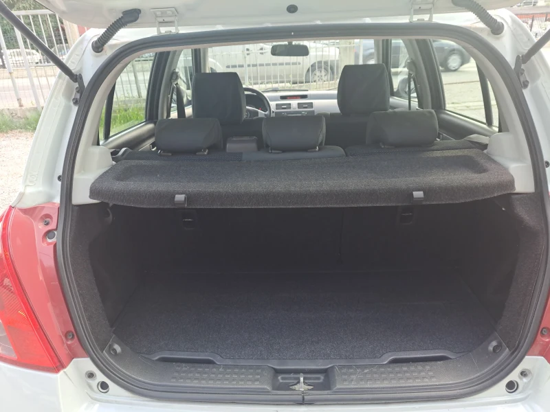 Suzuki Swift 1.3DDIS , снимка 10 - Автомобили и джипове - 51147203